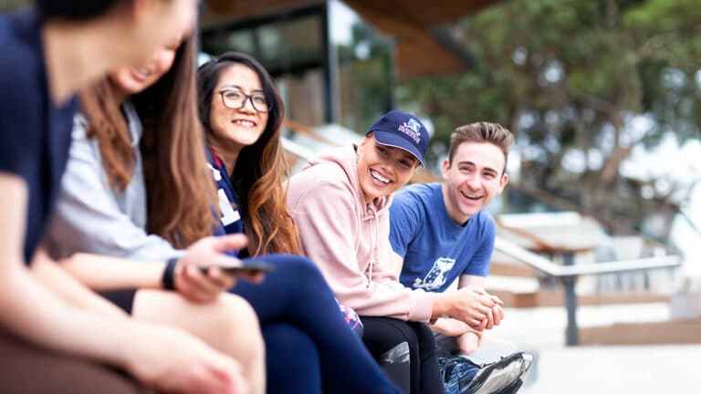 Melbourne university students smilng