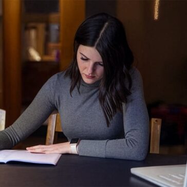 Young woman studying at home