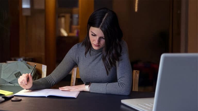Young woman studying at home